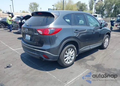 2015 Mazda Cx-5 Touring from USA, damaged, VIN JM3KE2CY5F0461184